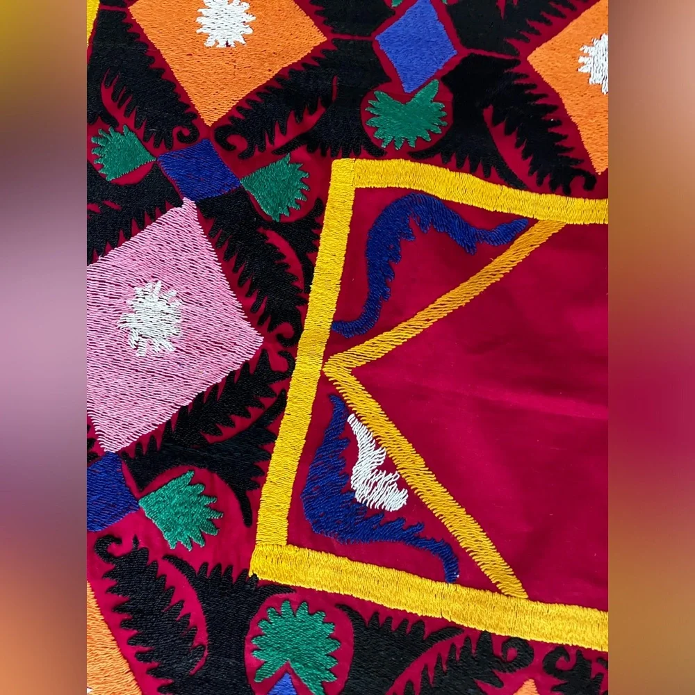 Suzane embroidered with cotton threads on cotton red fabric, hand made